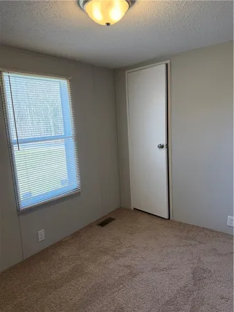 $124,900 | 402 Round Pond Road, Unit TN10, Smithville, NY 13841