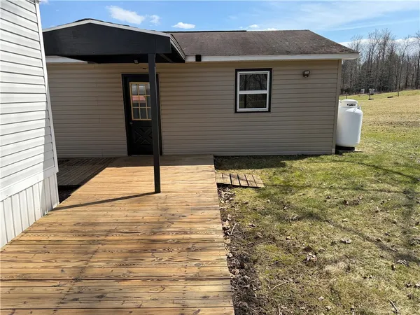 $124,900 | 402 Round Pond Road, Unit TN10, Smithville, NY 13841