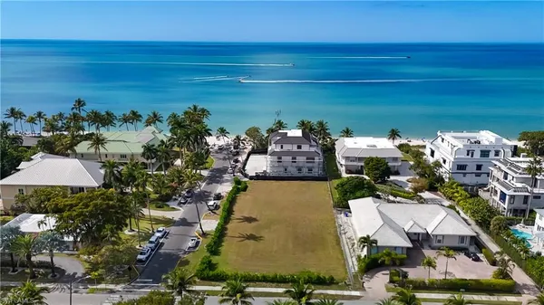 a aerial view of a house with a yard