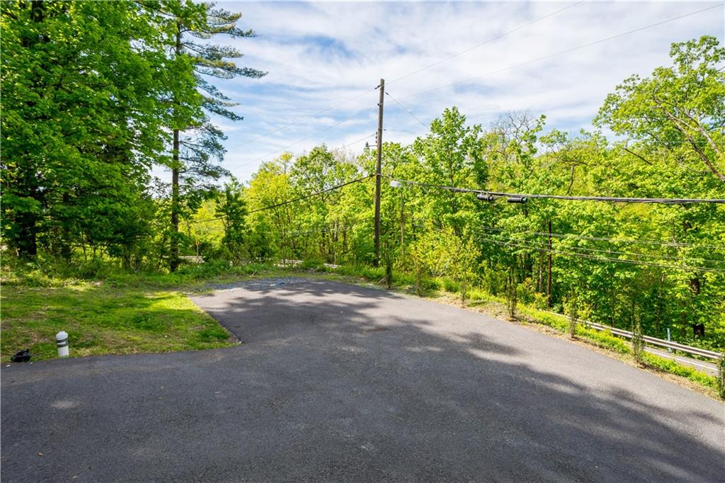 933 Boyce Road Bridgeville, PA 15017 - Photo 33 of 36 a backyard of a house with lots of green space