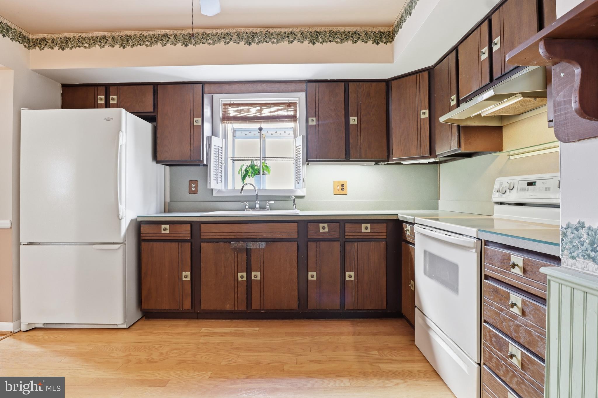 5200 Harmony Grove Road Dover, PA 17315 - Photo 11 of 50 a kitchen with stainless steel appliances granite countertop a refrigerator sink and cabinets