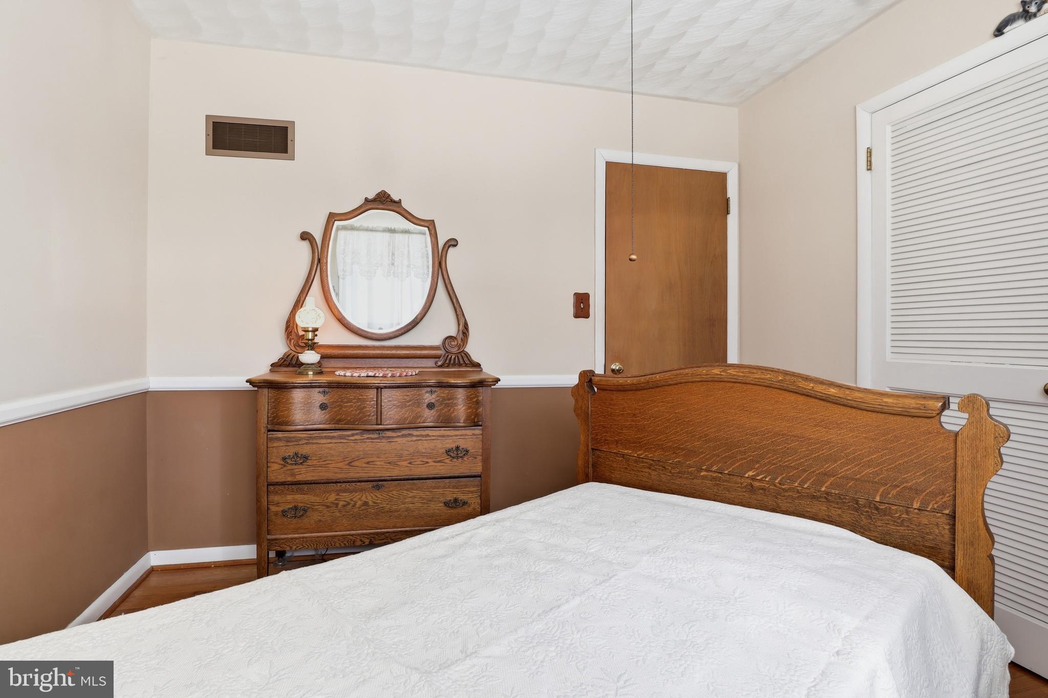 5200 Harmony Grove Road Dover, PA 17315 - Photo 17 of 50 a bedroom with a bed and a closet