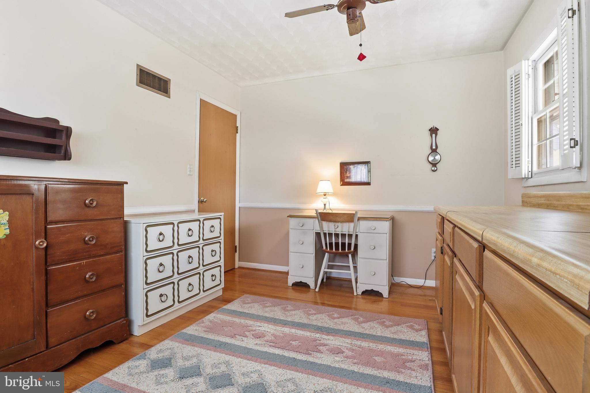 5200 Harmony Grove Road Dover, PA 17315 - Photo 23 of 50 a spacious bedroom with a bed and a dresser