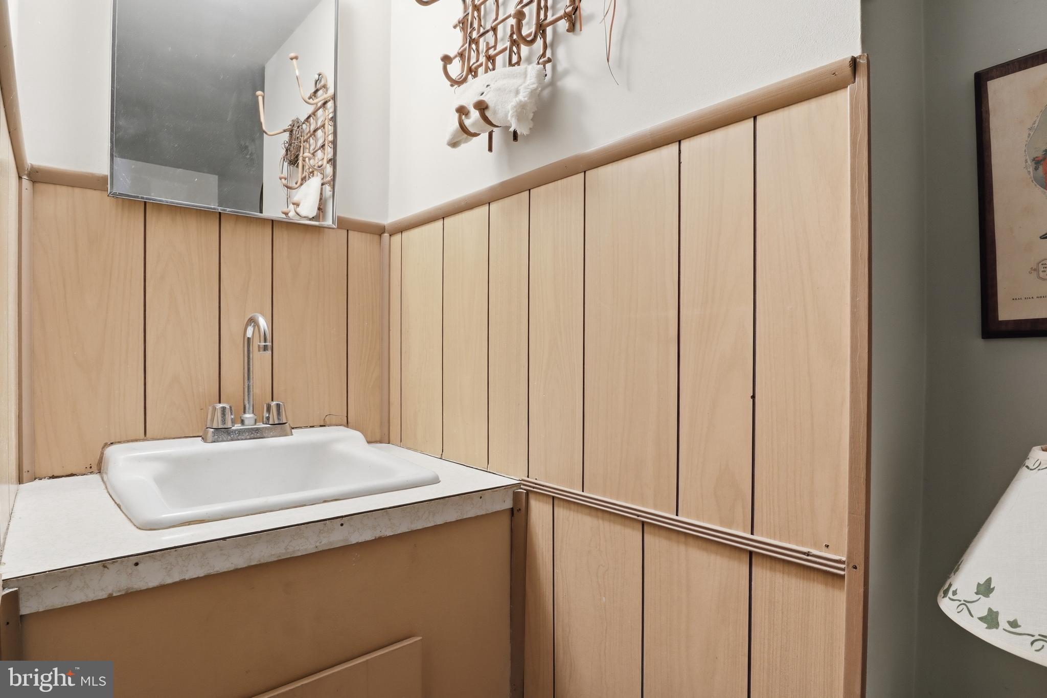 5200 Harmony Grove Road Dover, PA 17315 - Photo 24 of 50 a bathroom with a sink and a mirror
