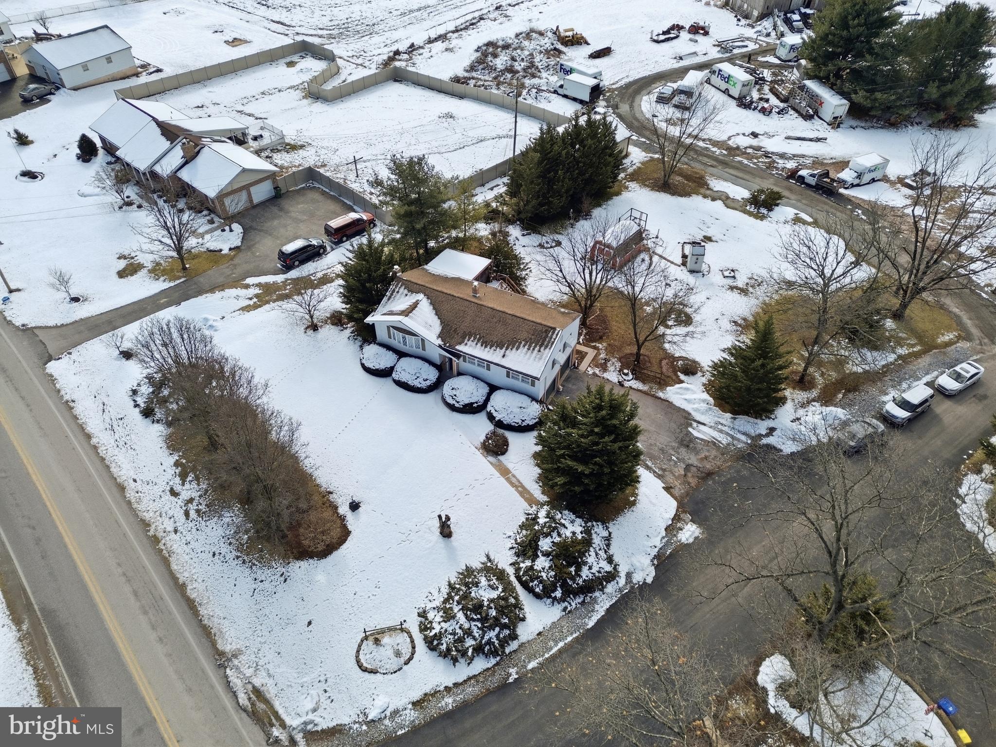 5200 Harmony Grove Road Dover, PA 17315 - Photo 44 of 50 an aerial view of a house with a yard and large trees