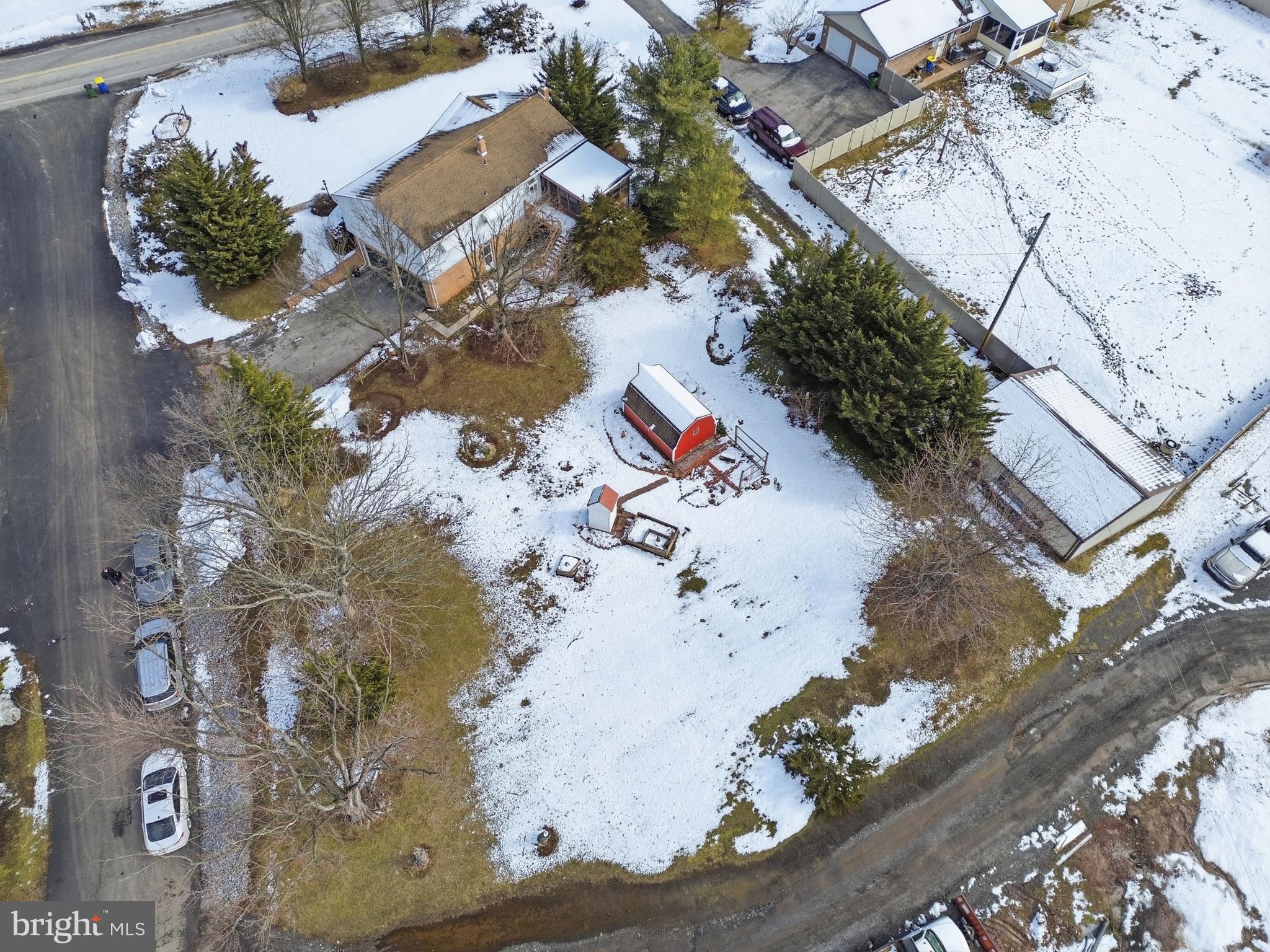 5200 Harmony Grove Road Dover, PA 17315 - Photo 45 of 50 an aerial view of a house with a yard and garden