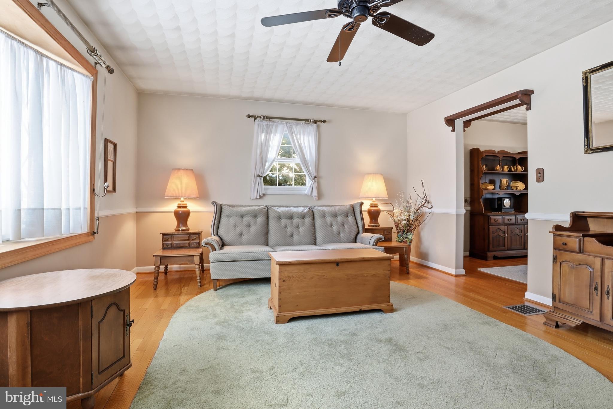 5200 Harmony Grove Road Dover, PA 17315 - Photo 6 of 50 a living room with furniture and a table