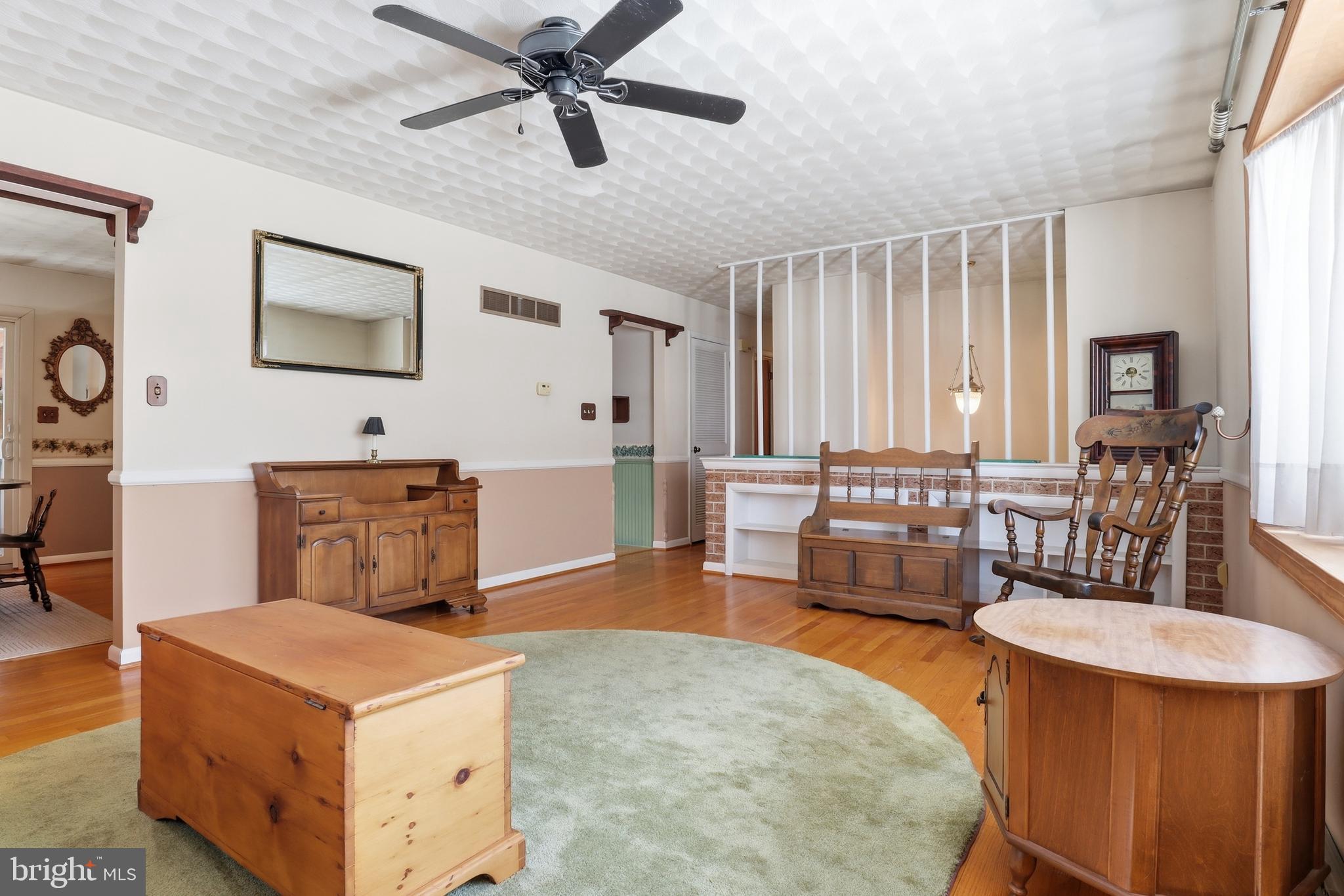 5200 Harmony Grove Road Dover, PA 17315 - Photo 7 of 50 a living room with furniture and a large window