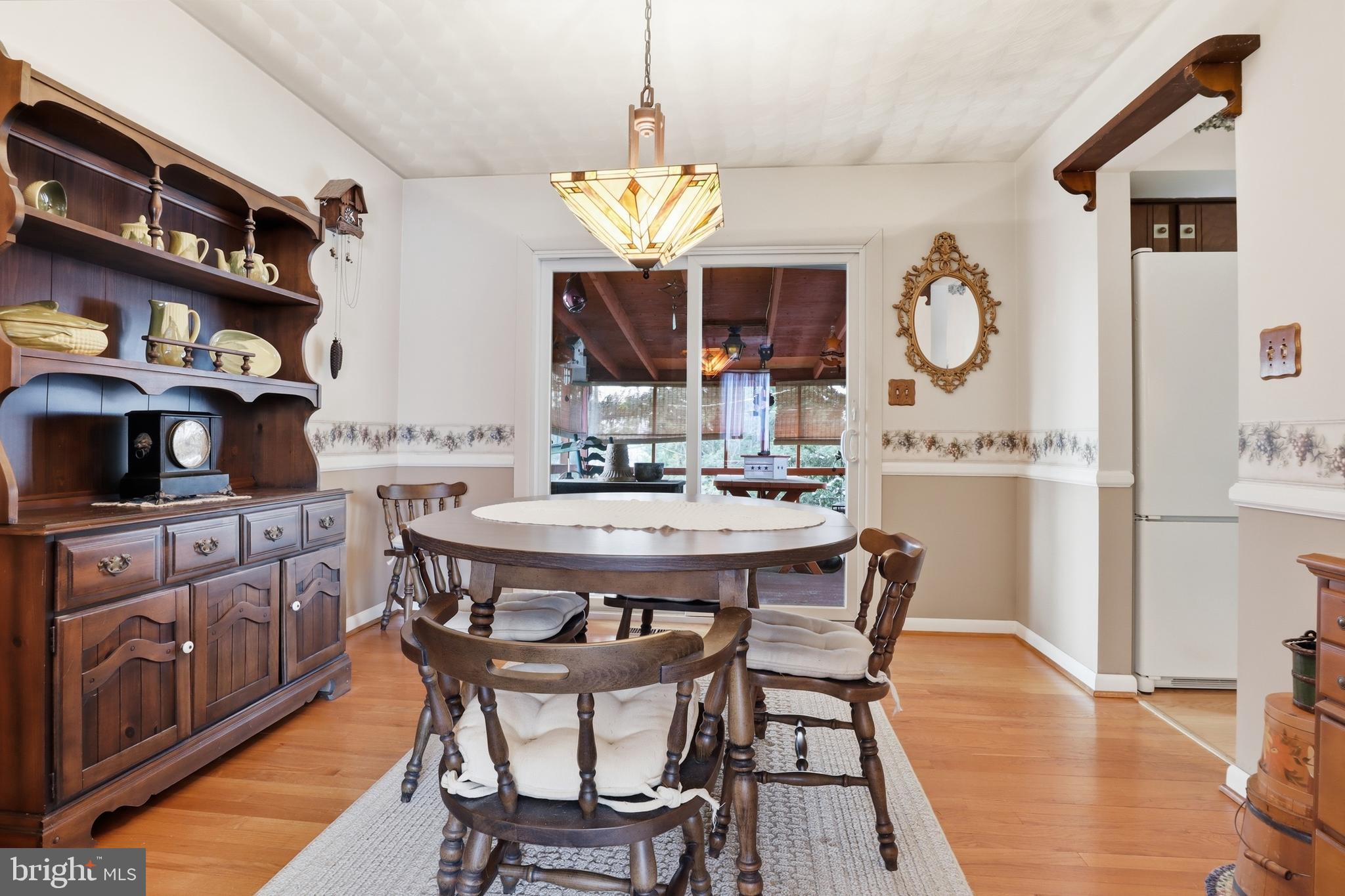 5200 Harmony Grove Road Dover, PA 17315 - Photo 8 of 50 a view of a dining room with furniture window and wooden floor