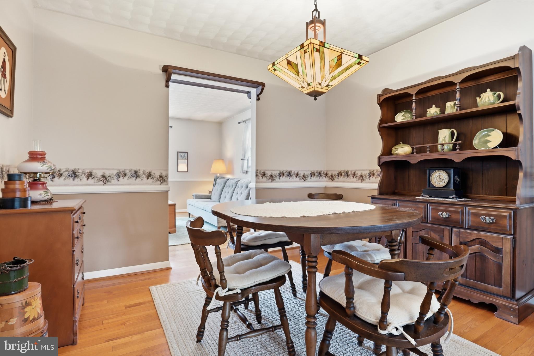 5200 Harmony Grove Road Dover, PA 17315 - Photo 9 of 50 a view of a dining room with furniture and chandelier