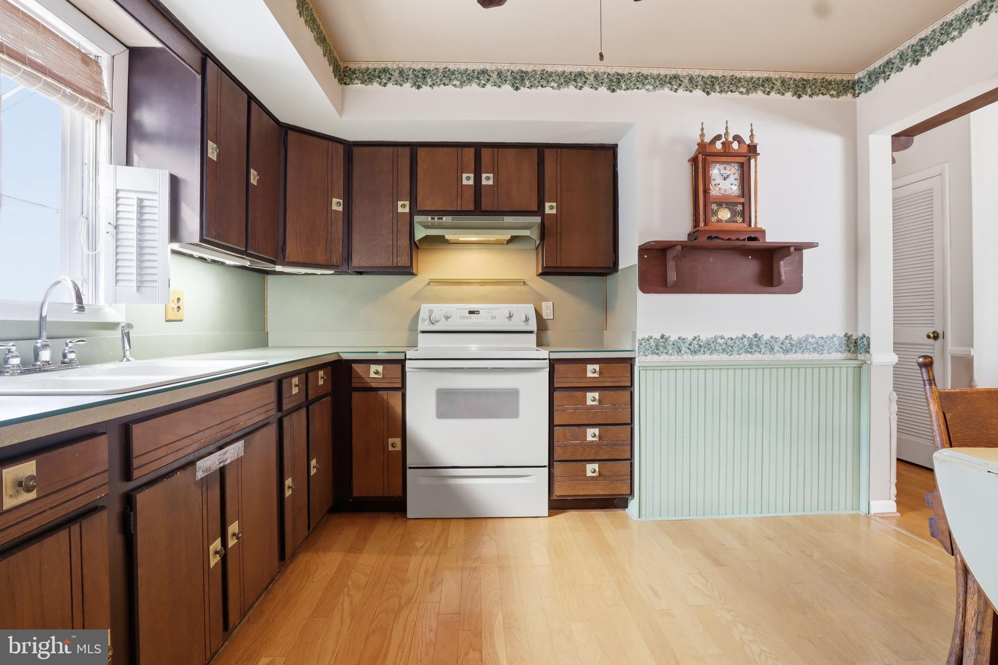 5200 Harmony Grove Road Dover, PA 17315 - Photo 10 of 50 a kitchen with stainless steel appliances granite countertop a stove and a sink