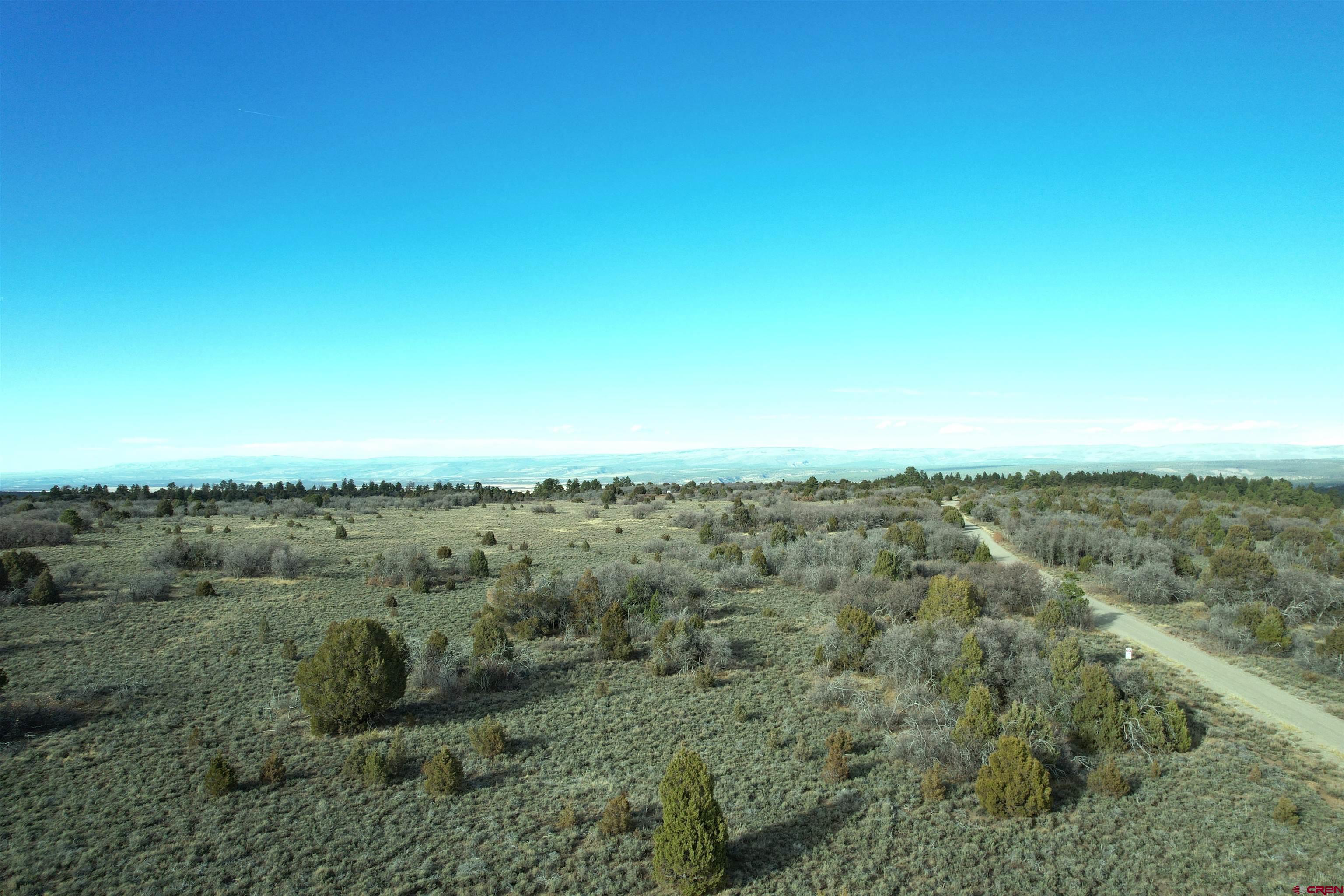 2 A West Beaver Pines Loop Norwood, CO 81423 - Photo 4 of 38 an aerial view of residential houses with outdoor space