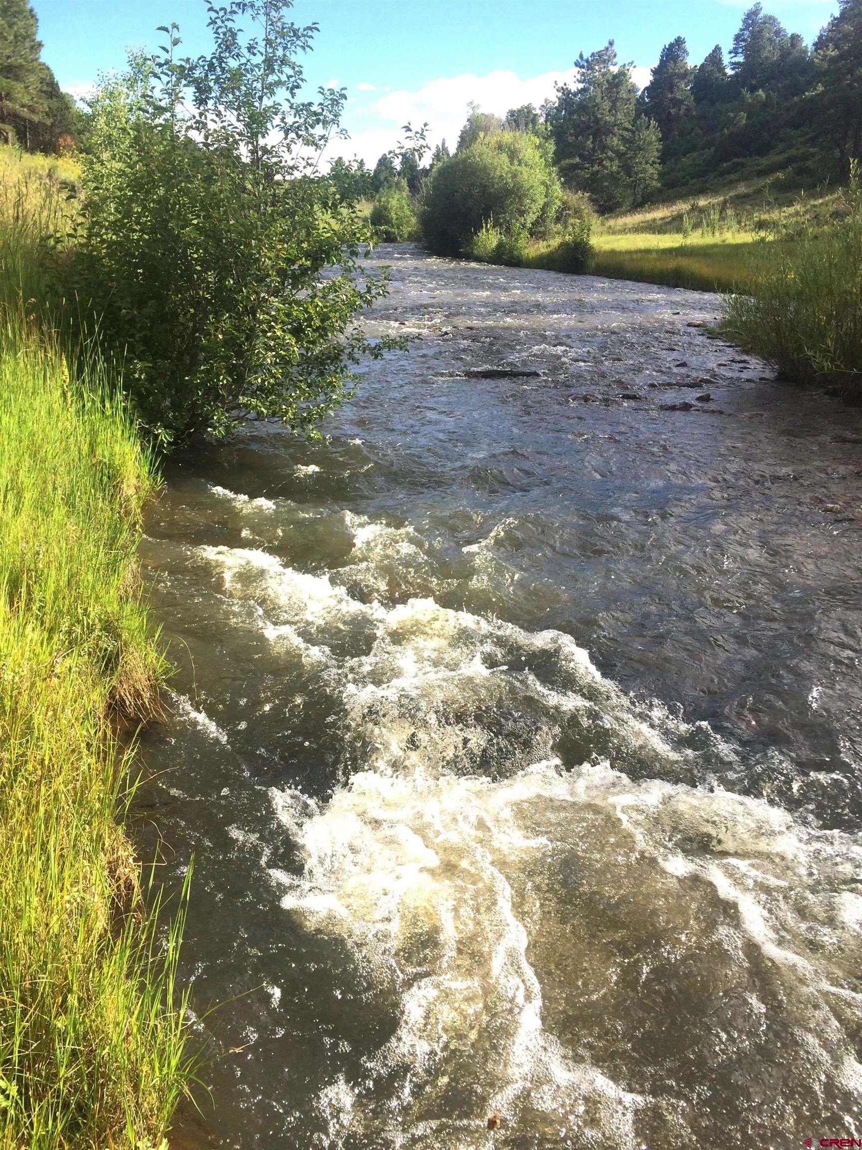 2 A West Beaver Pines Loop Norwood, CO 81423 - Photo 8 of 38 a view of a lake view with beach
