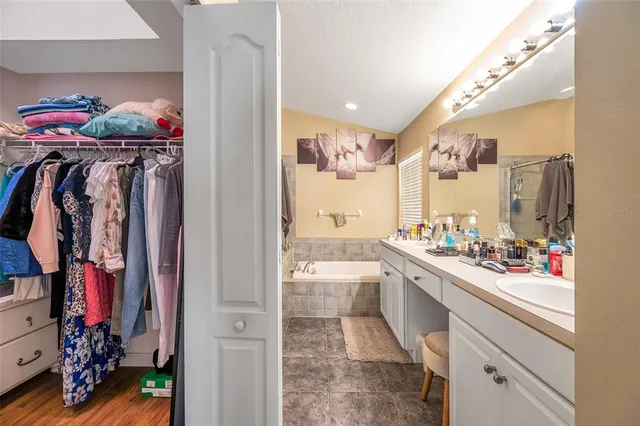 a bathroom with a bathtub and shower