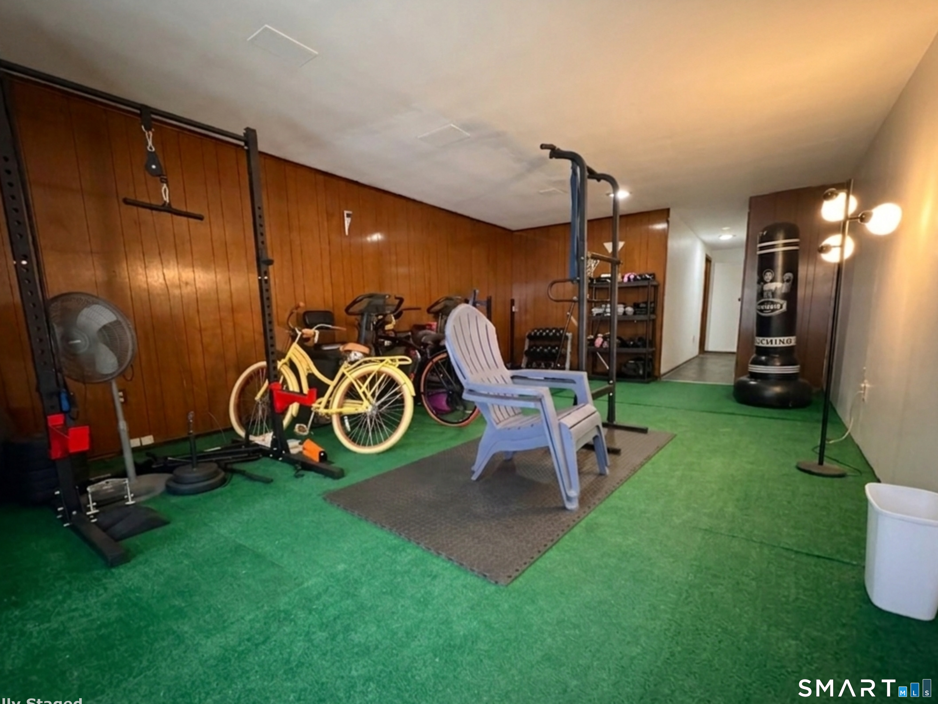 715 Frenchtown Road, Unit 49 Bridgeport, CT 06606 - Photo 26 of 28 Lower level additional space with storage could be an additional bedroom