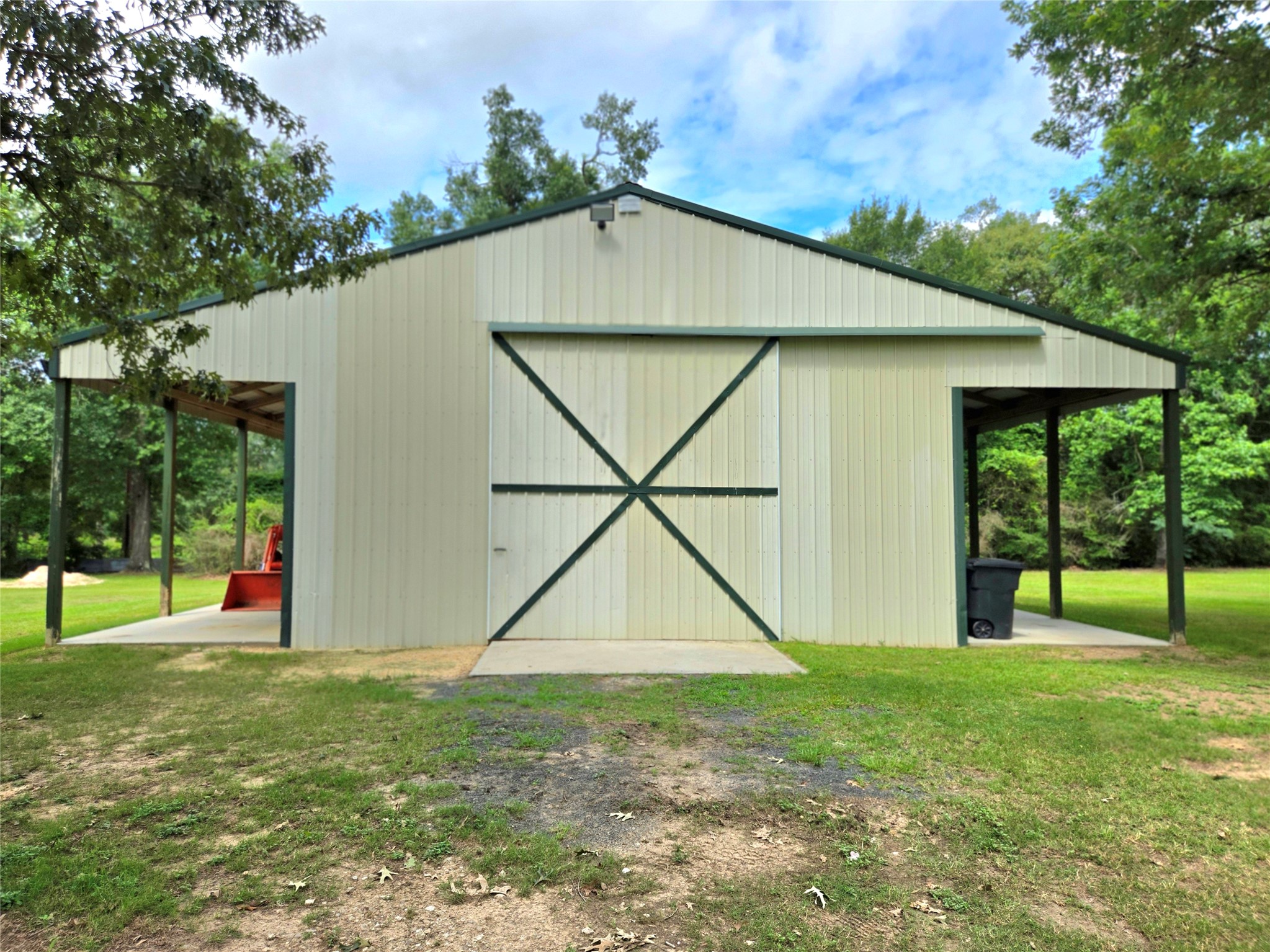 13580 Fm 2025 Road Cleveland, TX 77328 - Photo 48 of 50 Large Shop with covers on both sides