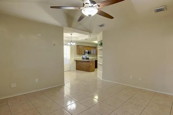 a view of a kitchen with a sink and dishwasher