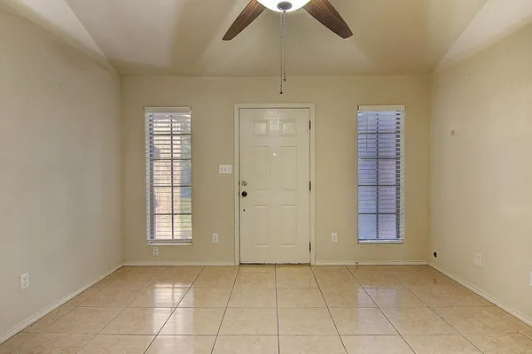 an empty room with windows