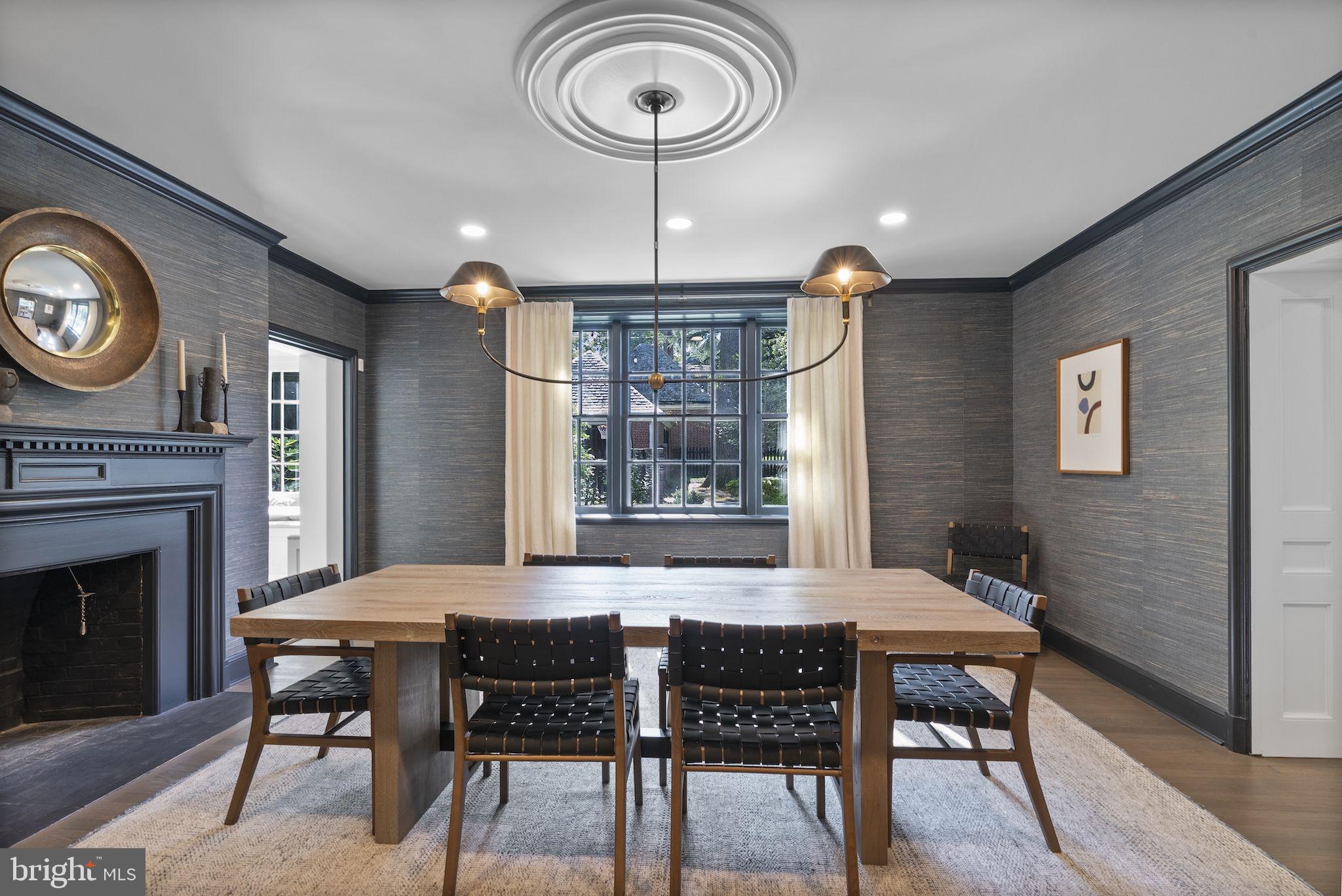 203 East Highfield Road Baltimore, MD 21218 - Photo 15 of 49 a view of a dining room with furniture window and wooden floor