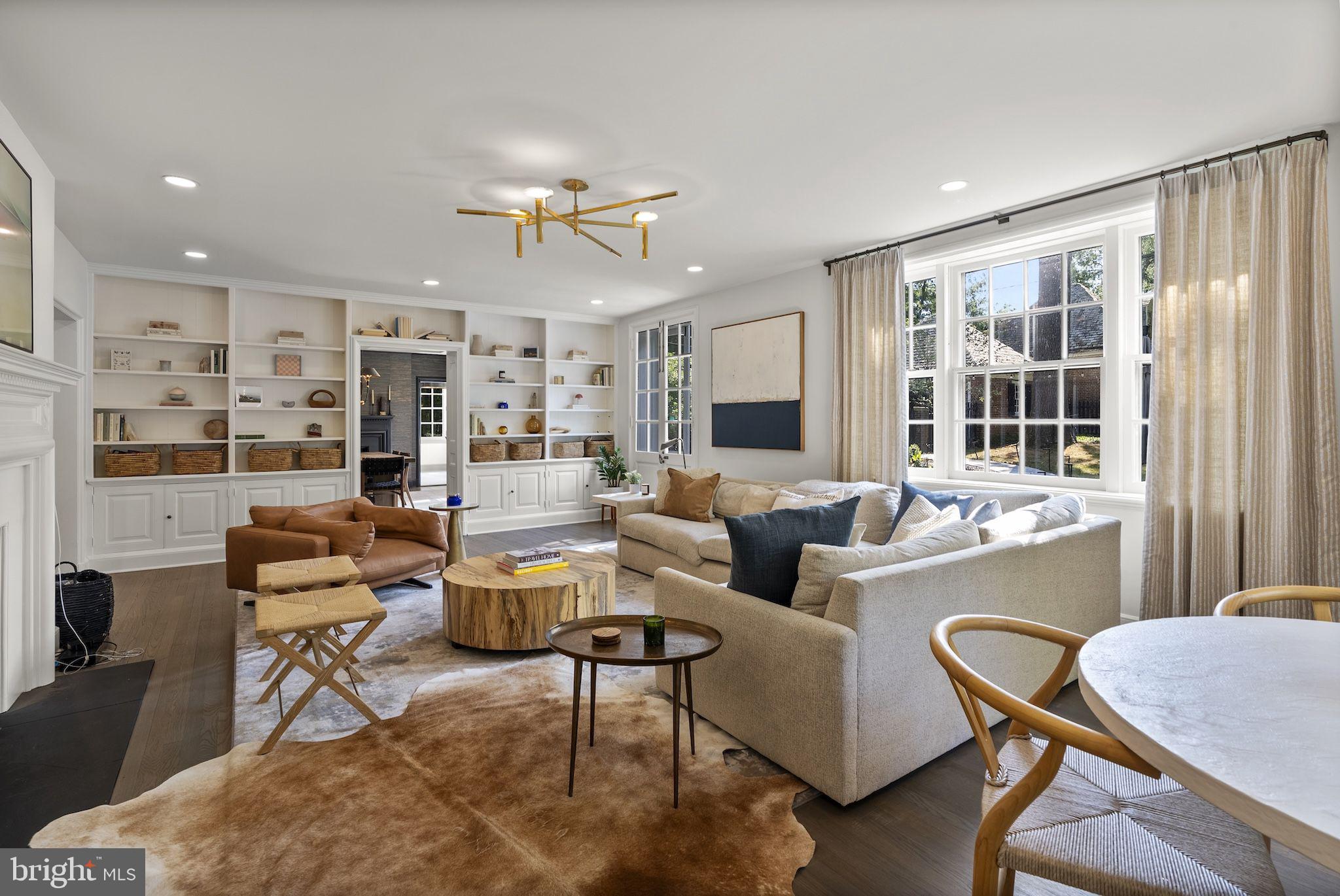 203 East Highfield Road Baltimore, MD 21218 - Photo 19 of 49 a living room with furniture and a flat screen tv