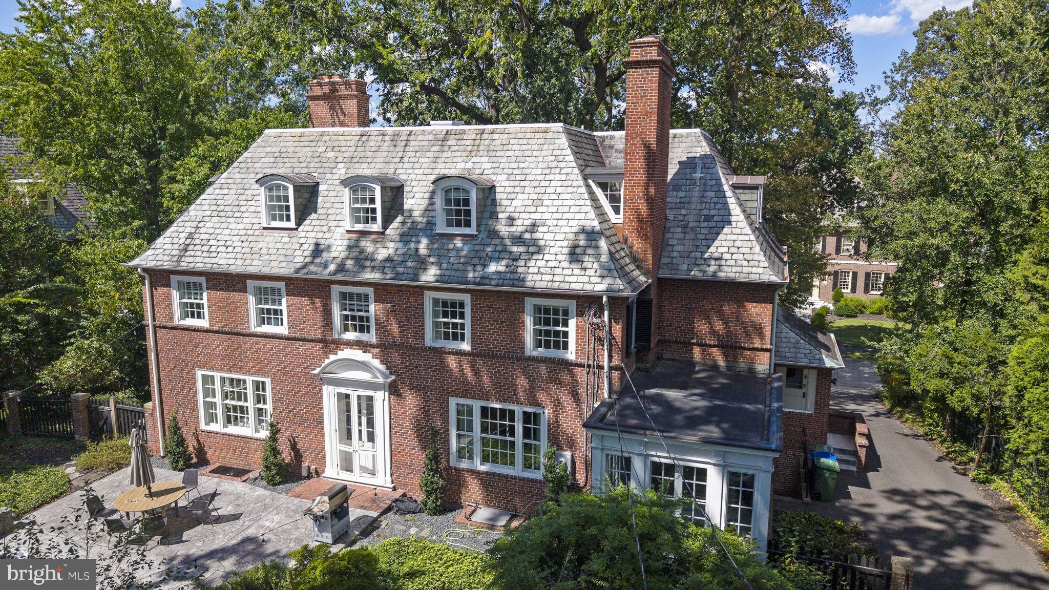 203 East Highfield Road Baltimore, MD 21218 - Photo 2 of 49 a front view of a house with a garden