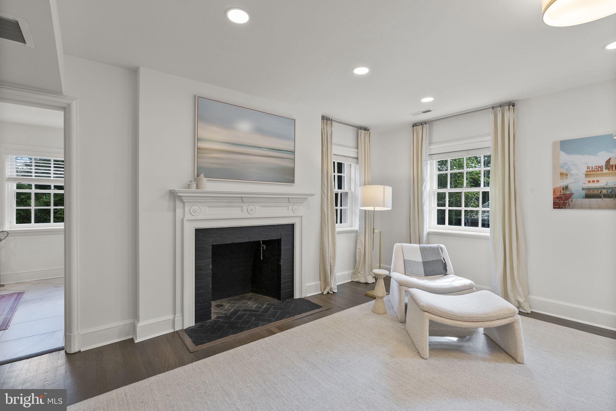 203 East Highfield Road Baltimore, MD 21218 - Photo 25 of 49 a living room with furniture and a fireplace