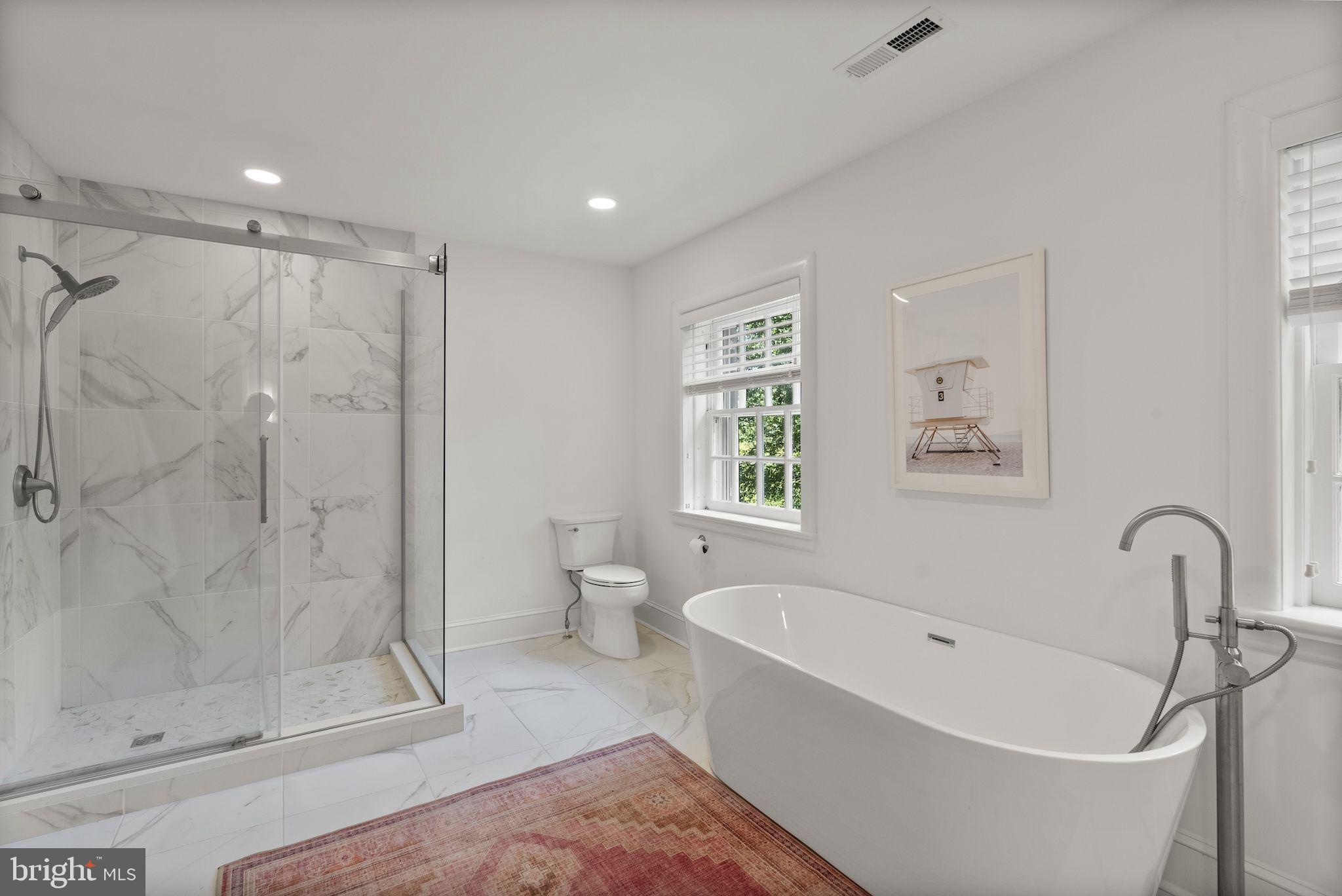 203 East Highfield Road Baltimore, MD 21218 - Photo 26 of 49 a bathroom with a bathtub and a shower