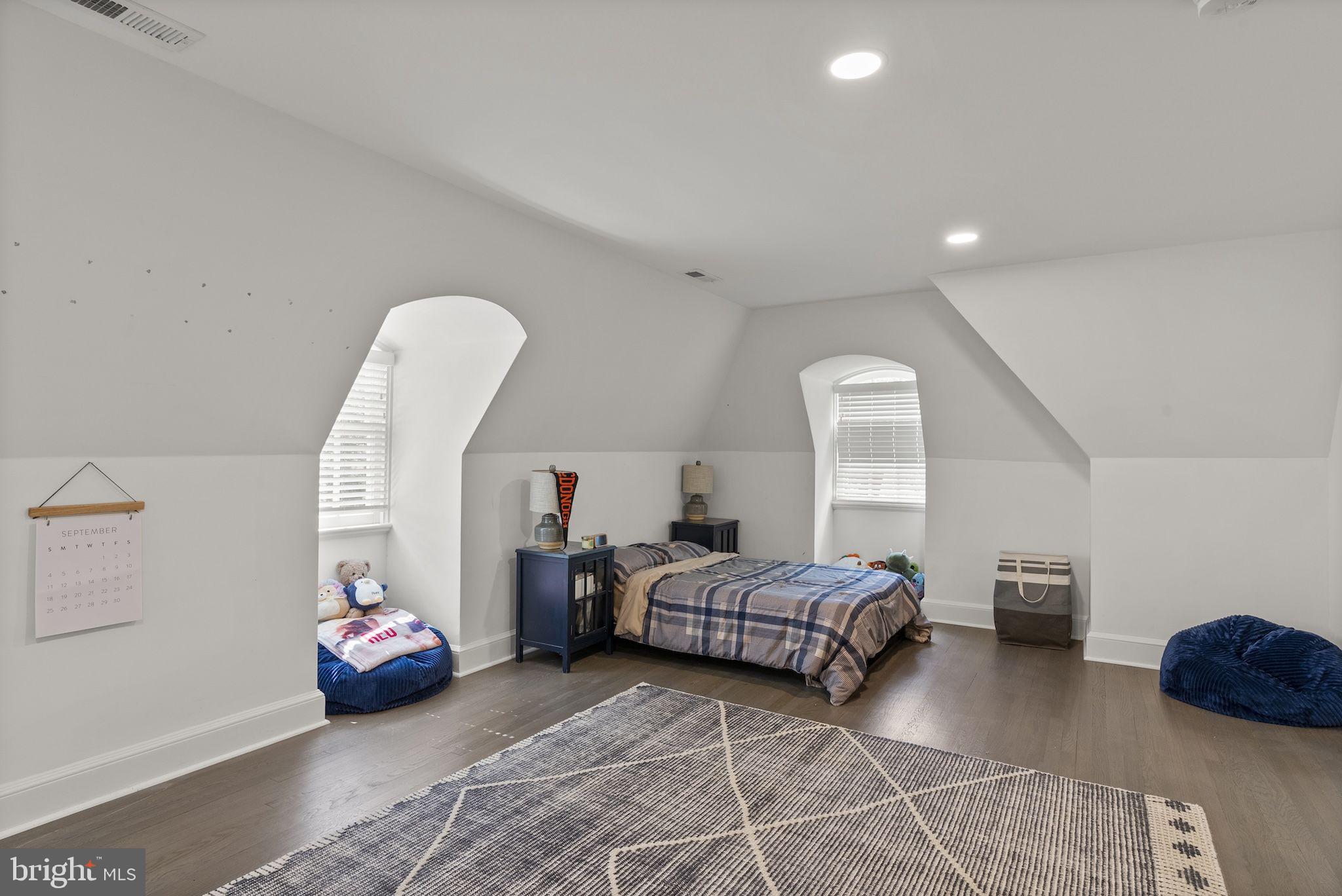 203 East Highfield Road Baltimore, MD 21218 - Photo 37 of 49 a bedroom with bed and window