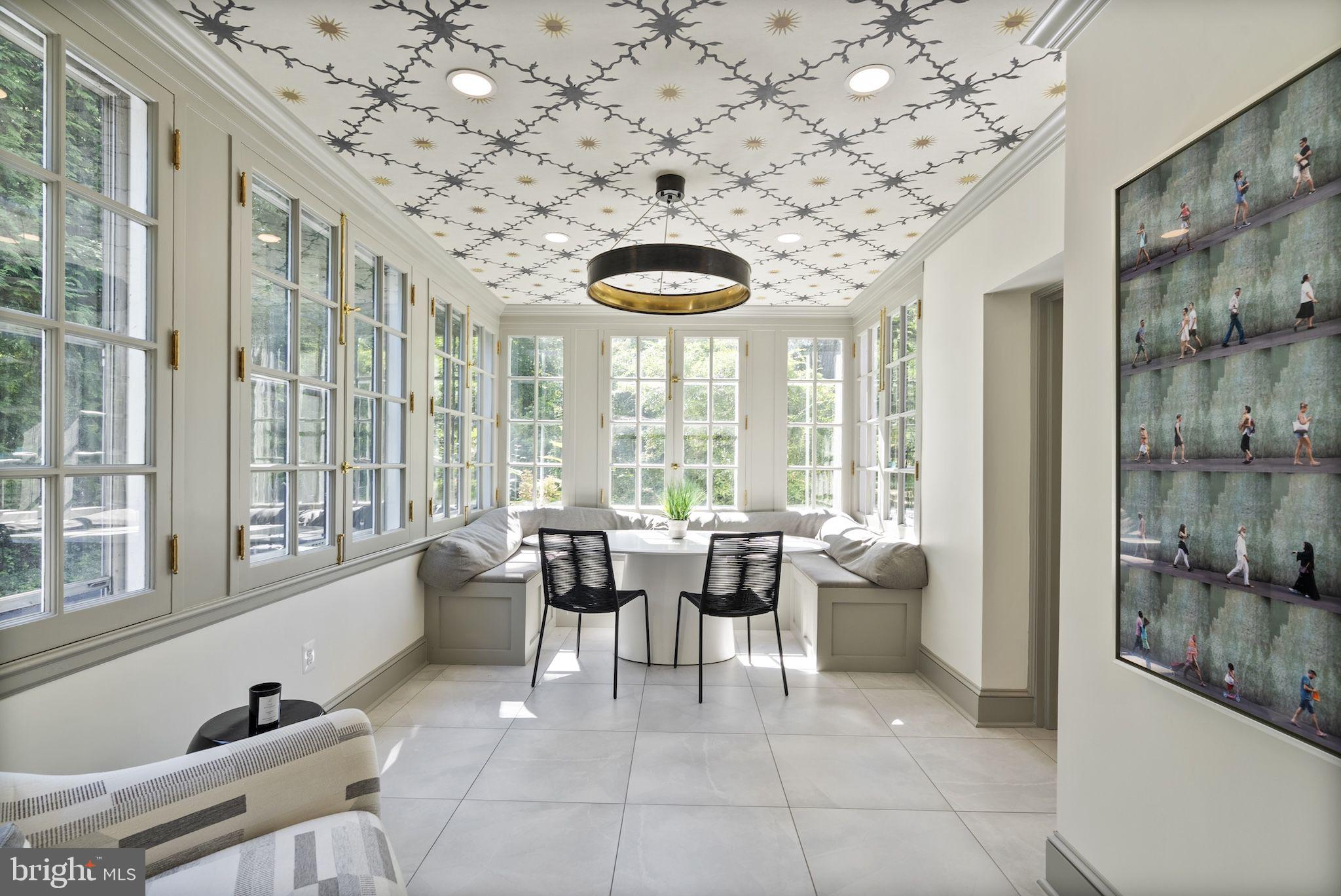 203 East Highfield Road Baltimore, MD 21218 - Photo 9 of 49 a lobby with furniture and large windows