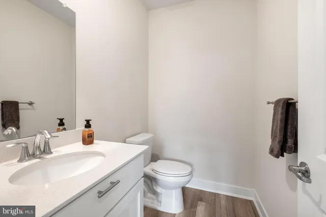 a bathroom with a sink and mirror