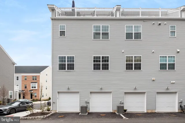 a front view of a building with windows