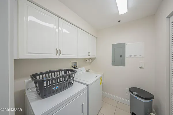 a kitchen with a sink cabinets and toilet