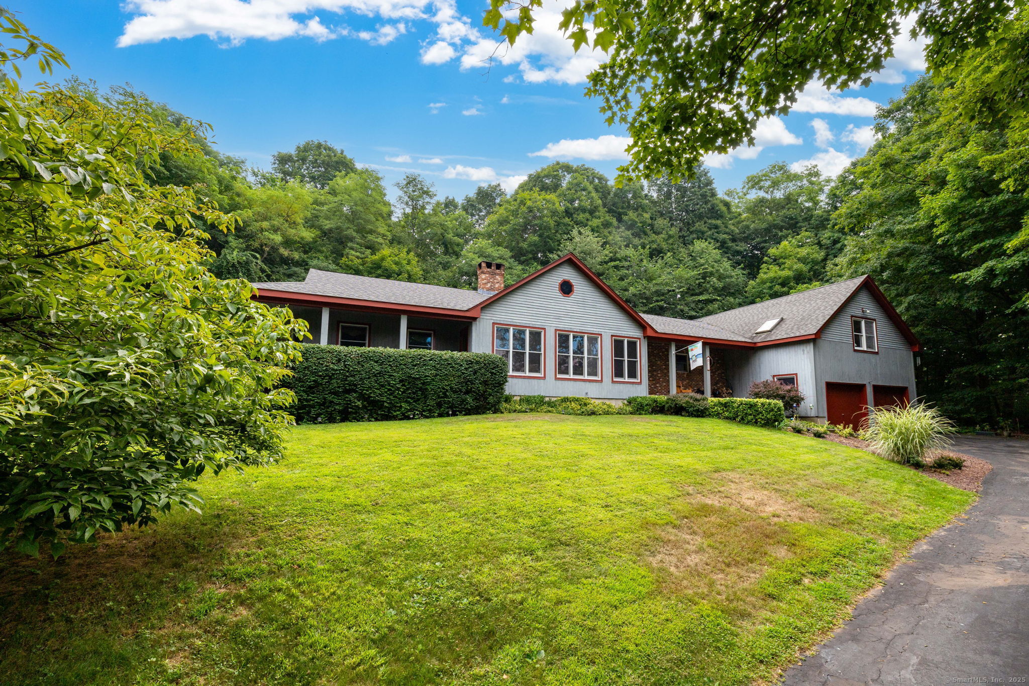 335 Toll Gate Road Berlin, CT 06037 - Photo 1 of 1 a front view of a house with yard and green space