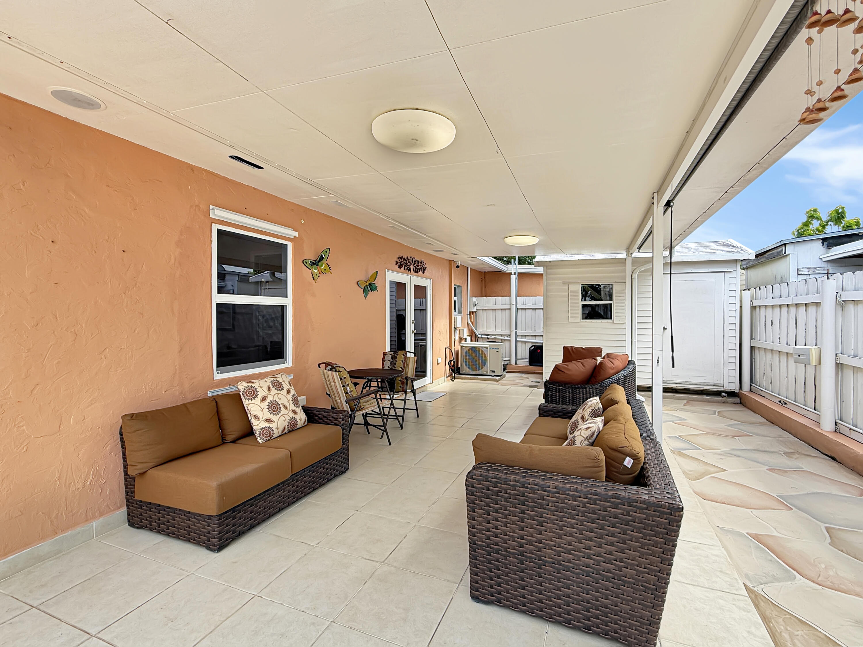 952 Sumter Road East West Palm Beach, FL 33415 - Photo 19 of 20 Covered Patio