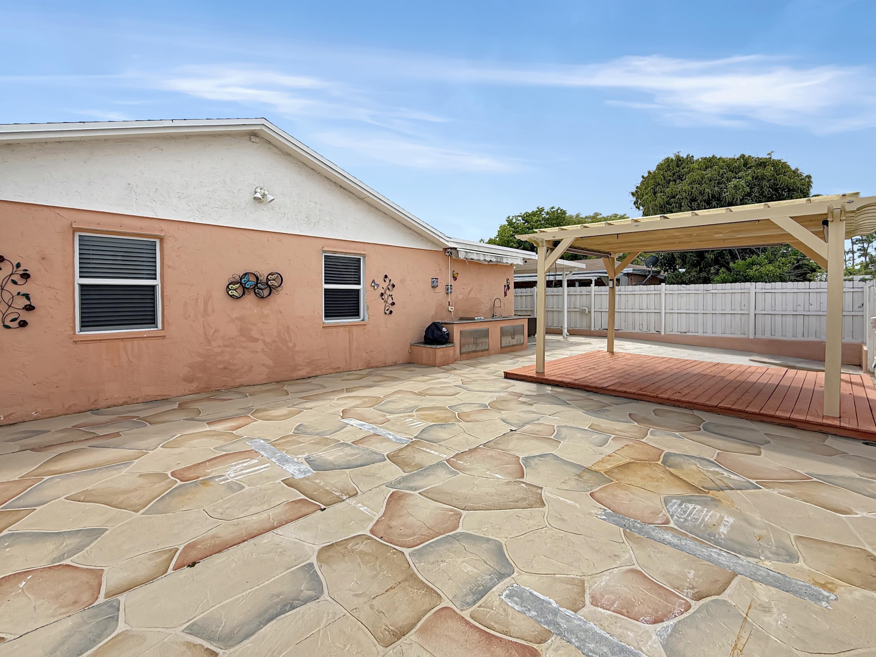 952 Sumter Road East West Palm Beach, FL 33415 - Photo 20 of 20 Patio - Pergola