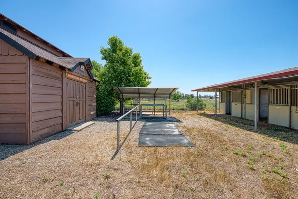 a view of backyard with green space