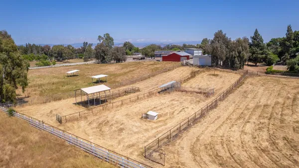 a view of a backyard of a house