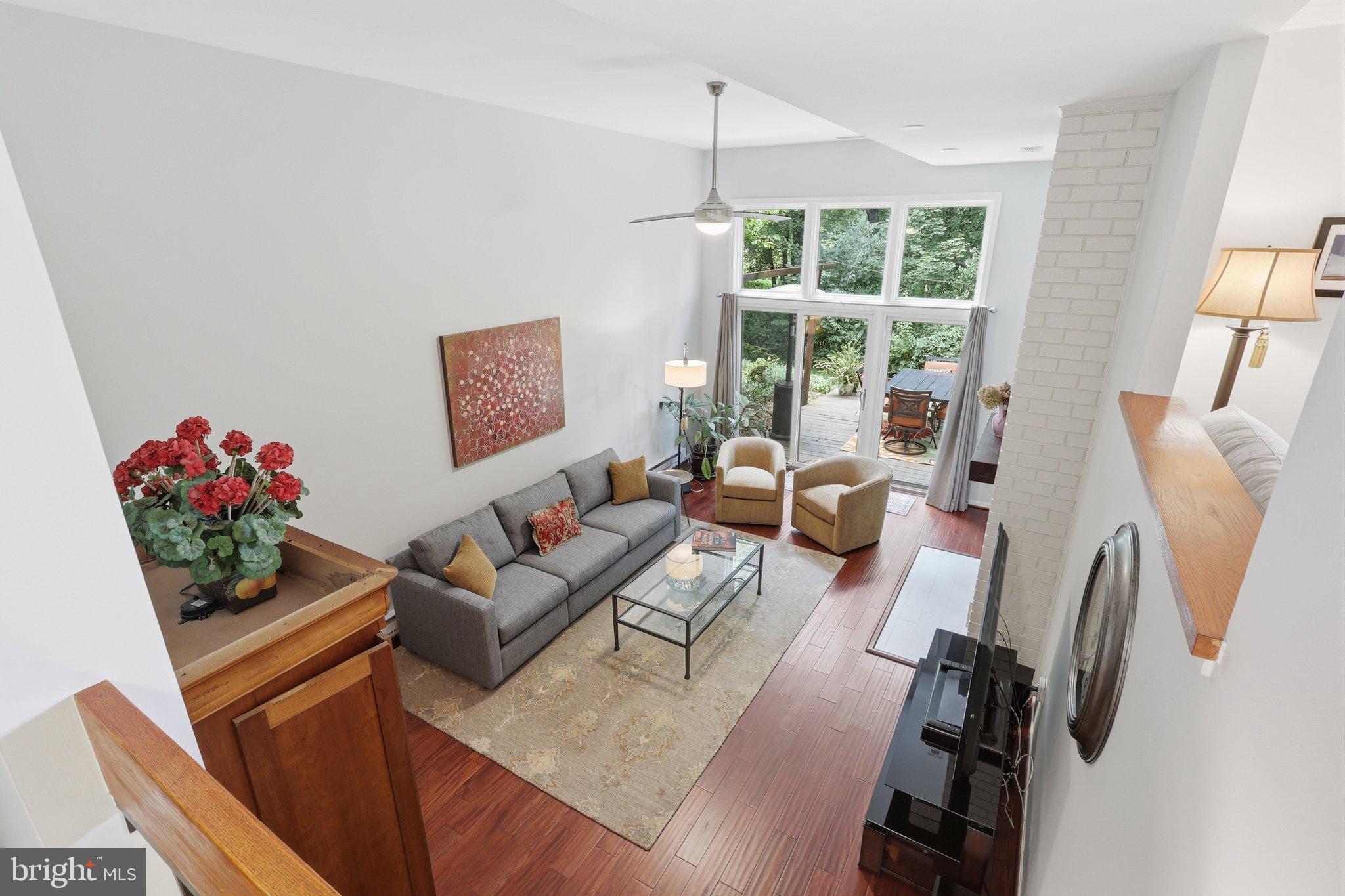 11615 Hunters Green Court Reston, VA 20191 - Photo 25 of 66 Family room on the lower level w/ wall of windows