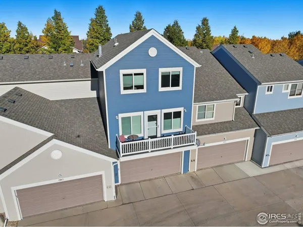 a front view of a house with a garage