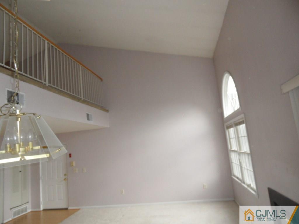 432 Edpas Road, Unit 432 New Brunswick, NJ 08901 - Photo 4 of 22 a view of entryway and hall with a window