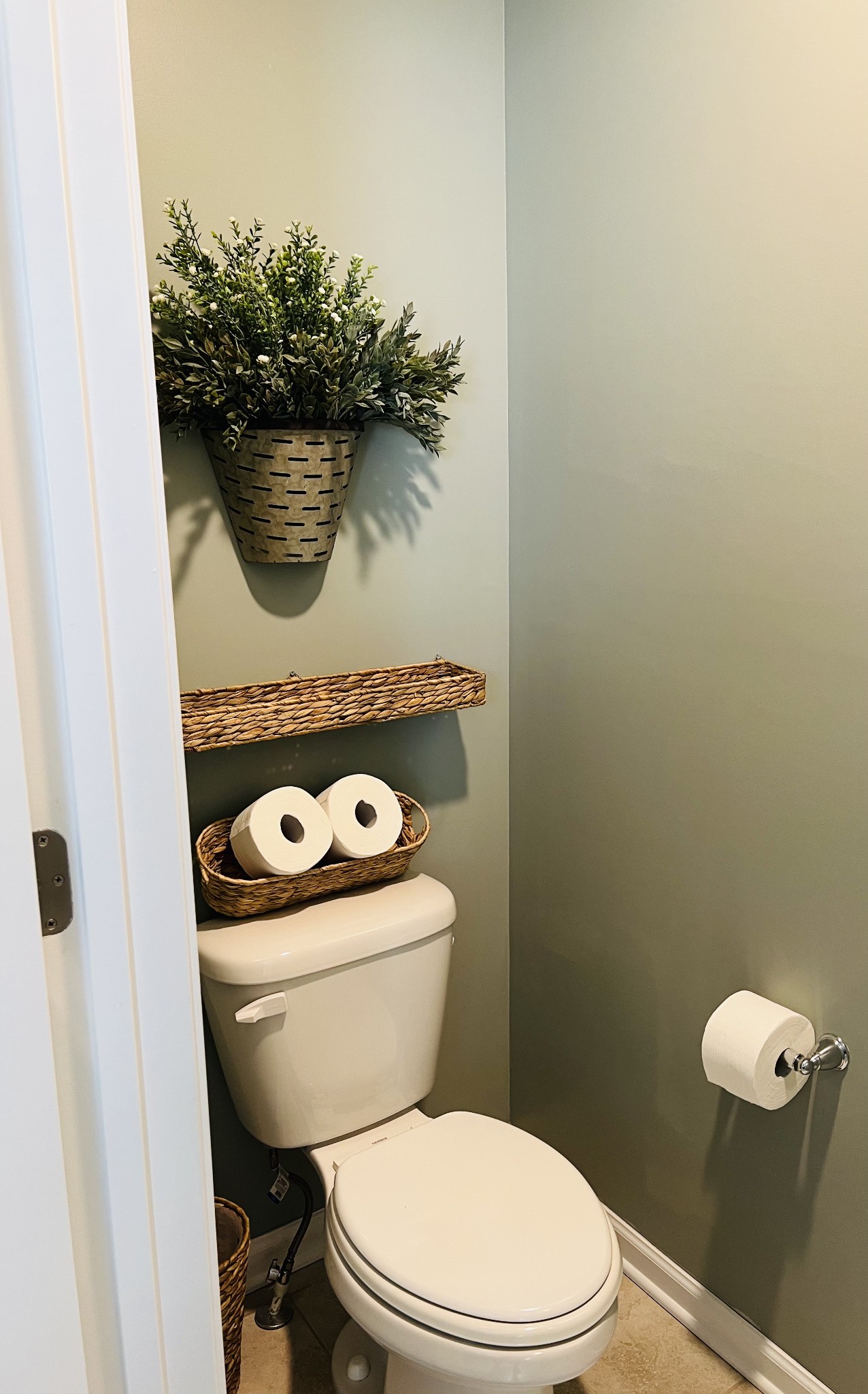 410 Prestige Court Pleasant View, TN 37146 - Photo 4 of 13 a white toilet sitting next to a small sink