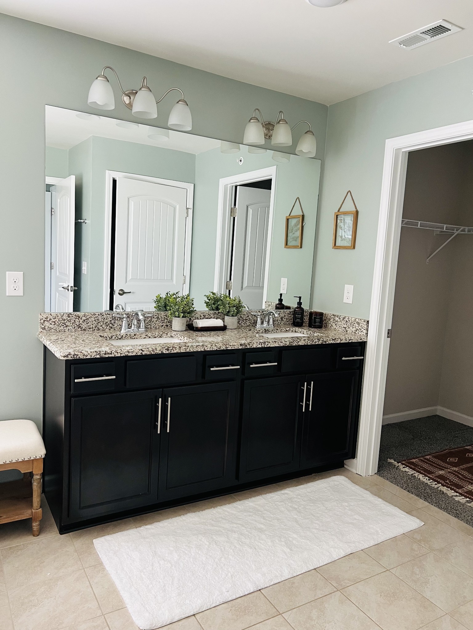410 Prestige Court Pleasant View, TN 37146 - Photo 9 of 13 a bathroom with a sink double vanity and a mirror