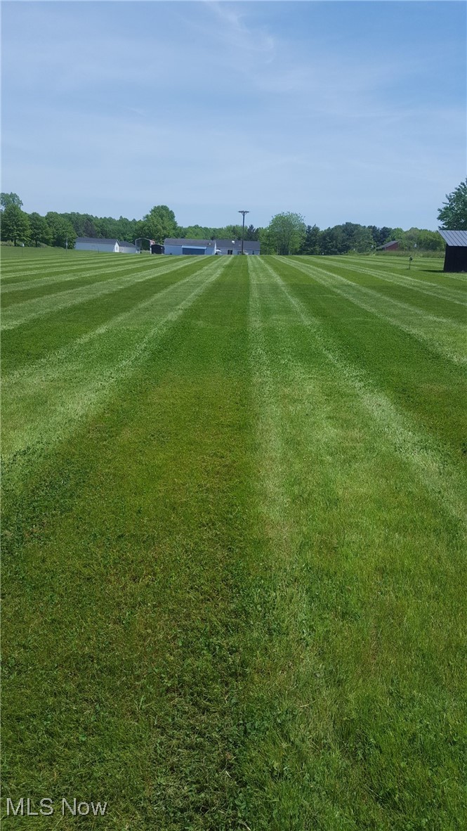 893 Industry Road Atwater, OH 44201 - Photo 11 of 50 View of property's community with a yard