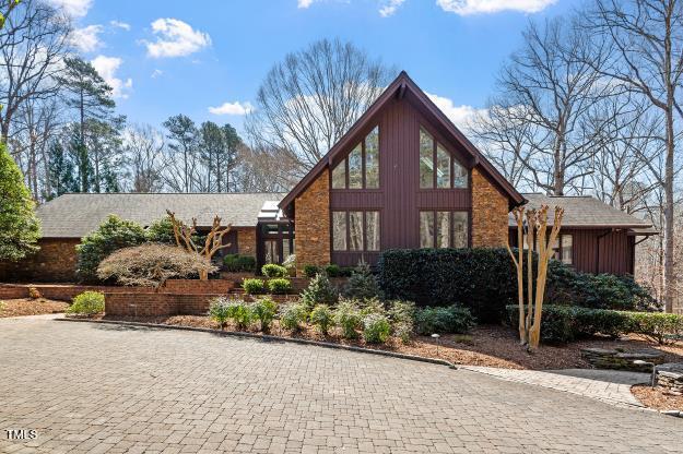 10729 Trego Trail Raleigh, NC 27614 - Photo 6 of 65 a front view of a house with a yard and outdoor seating