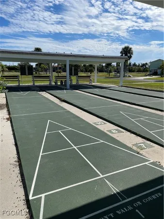 a view of a patio with swimming pool