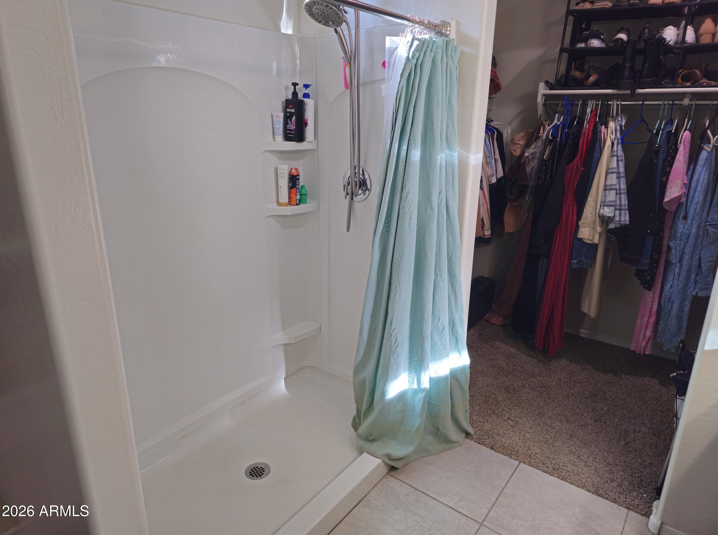 9434 Cotton Road Florence, AZ 85132 - Photo 14 of 25 a close view of walk in closet