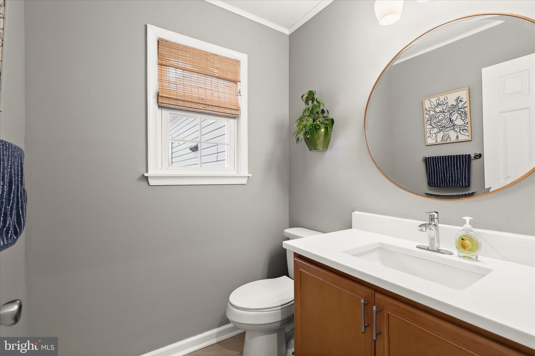 13 Farm Ridge Court Baldwin, MD 21013 - Photo 23 of 61 a bathroom with a toilet sink and mirror
