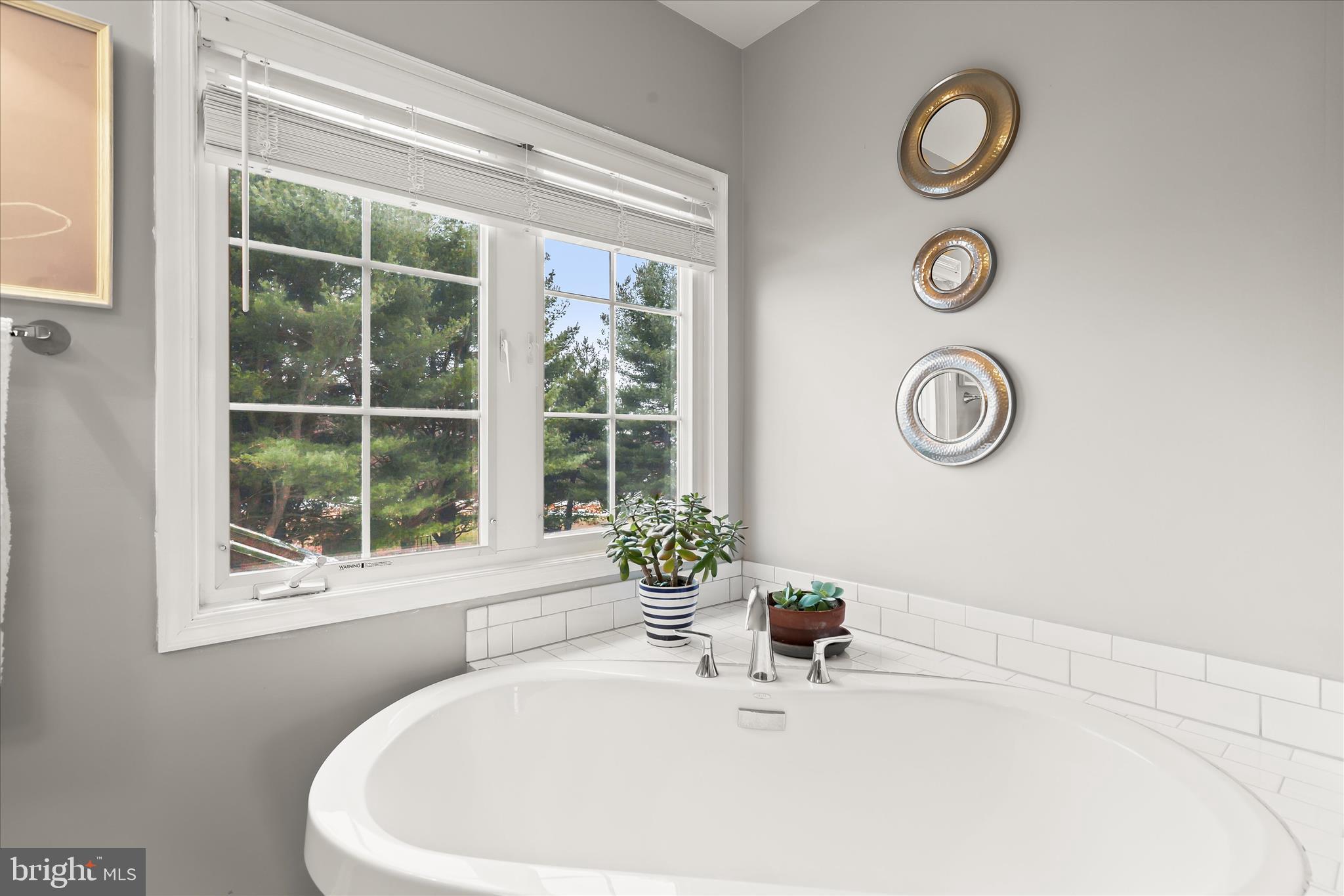 13 Farm Ridge Court Baldwin, MD 21013 - Photo 29 of 61 a bathroom with a sink and a mirror