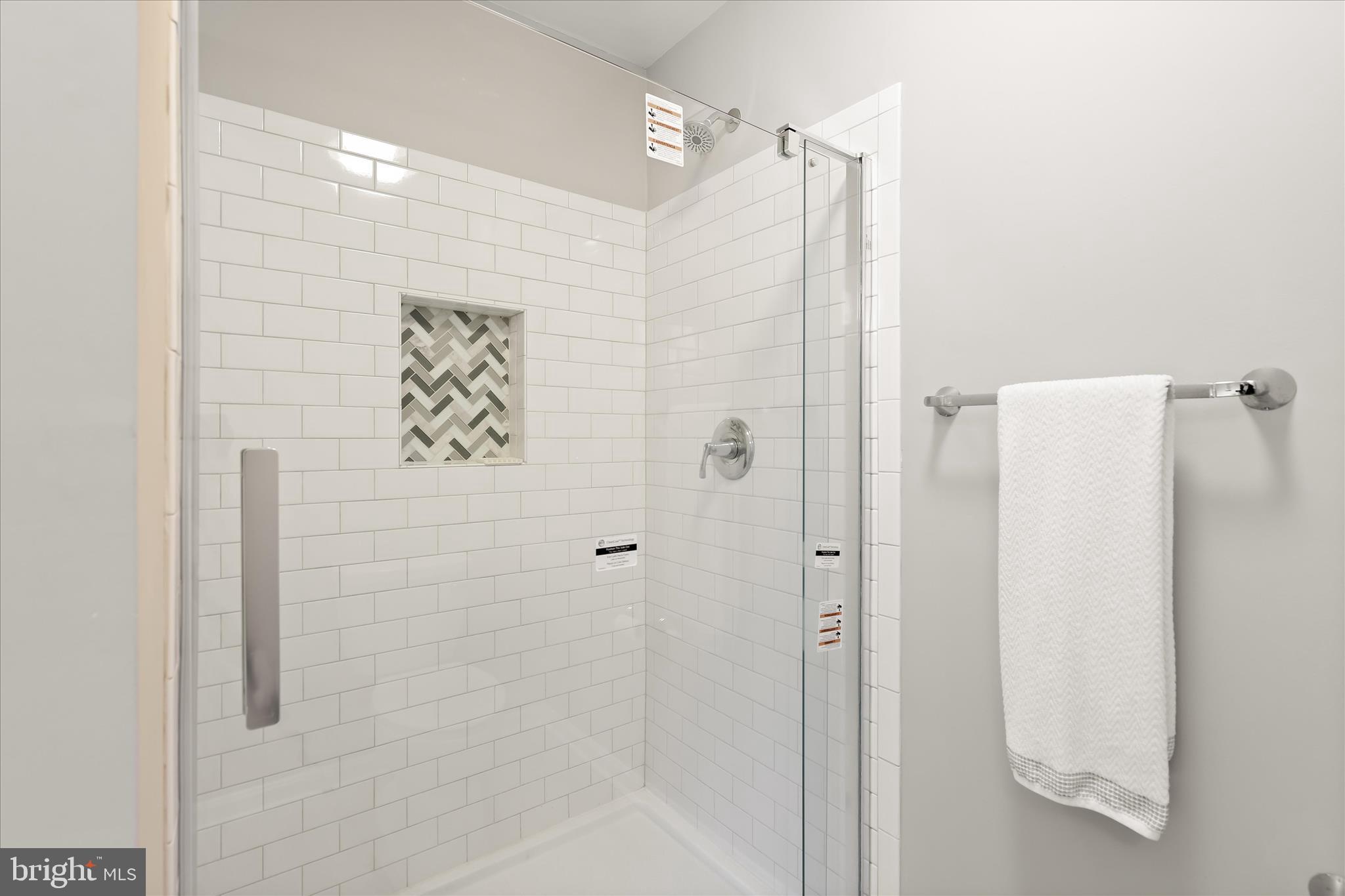 13 Farm Ridge Court Baldwin, MD 21013 - Photo 30 of 61 a bathroom with a shower and a glass door