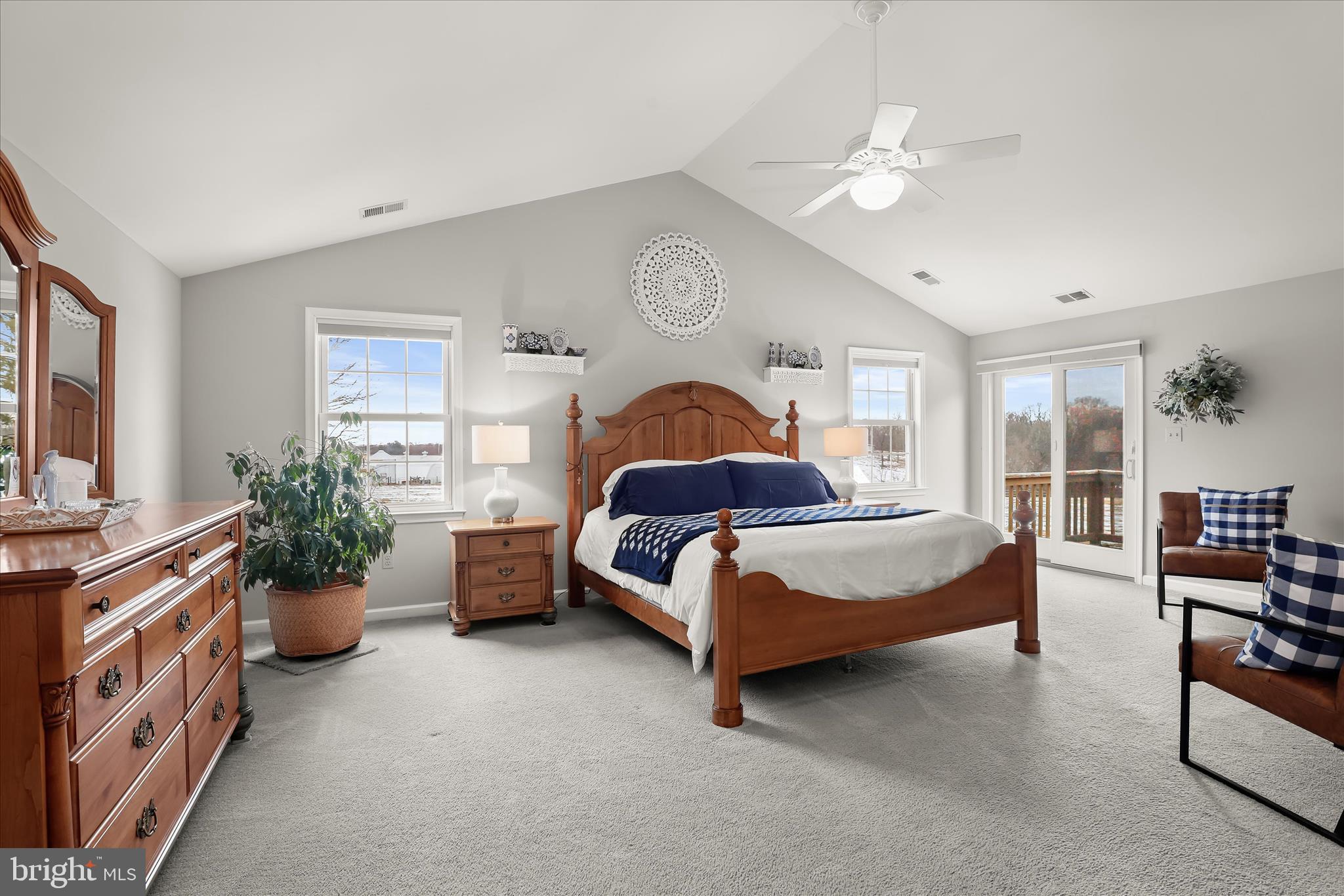 13 Farm Ridge Court Baldwin, MD 21013 - Photo 32 of 61 a spacious bedroom with a bed and a chandelier